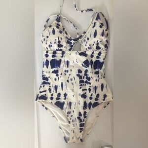 One piece swimsuit. Dark blue and white.